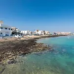 Апартаменты Home2book Poolside & Terrace Retreat, Corralejo Ла-Олива